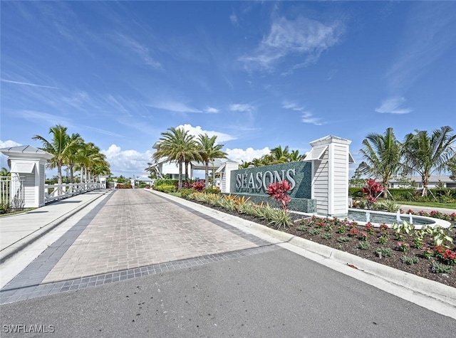 28268 Seasons Tide Ave, Bonita Springs, FL 34135 - view of asphalt road featuring curbs