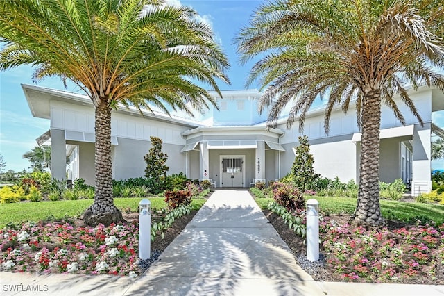 28268 Seasons Tide Ave, Bonita Springs, FL 34135 - view of front of home with stucco siding