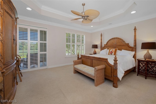 bedroom featuring light colored carpet, ornamental molding, a raised ceiling, recessed lighting, and access to exterior