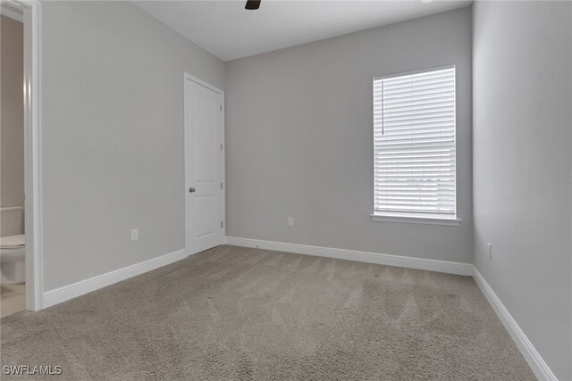 3307 Pilot Cir, Naples, FL 34120 - carpeted spare room featuring ceiling fan and baseboards