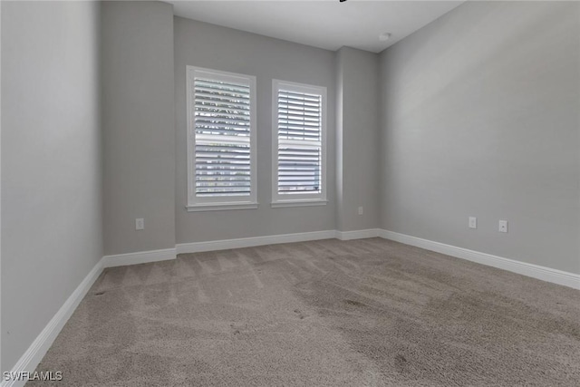 3307 Pilot Cir, Naples, FL 34120 - carpeted spare room featuring baseboards