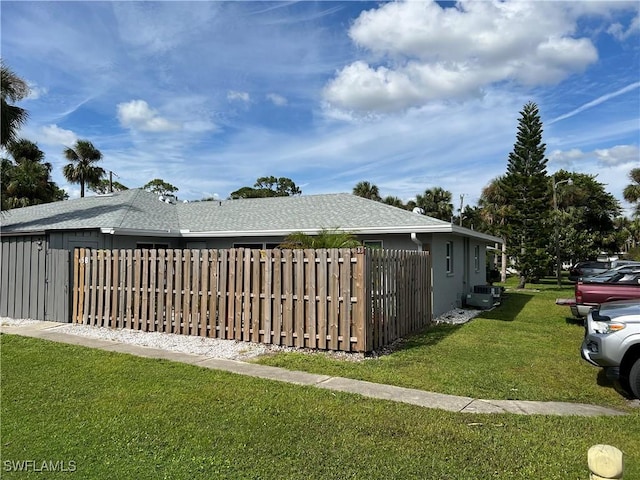 1165 Palm Ave Unit 5B, North Fort Myers, FL 33903 - view of home's exterior with roof with shingles