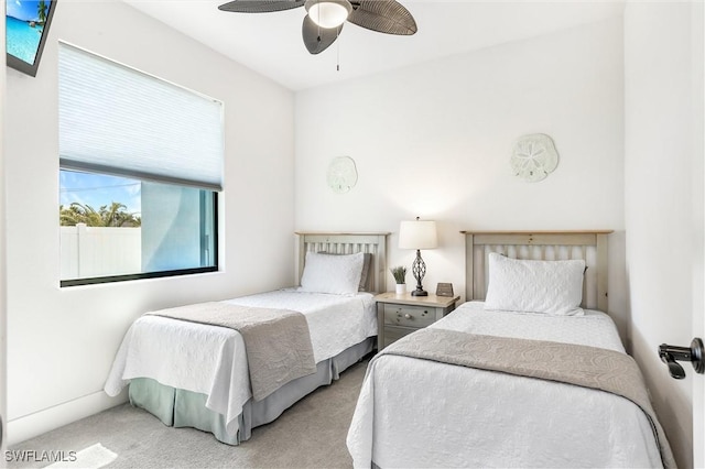 bedroom featuring carpet flooring and a ceiling fan