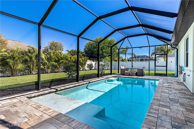 swimming pool with a patio area, a lanai, and outdoor lounge area