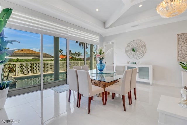 1070 Dana Ct, Marco Island, FL 34145 - dining room with recessed lighting, a tray ceiling, tile patterned floors, and baseboards