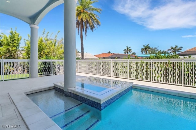 1070 Dana Ct, Marco Island, FL 34145 - view of pool with an in-ground hot tub