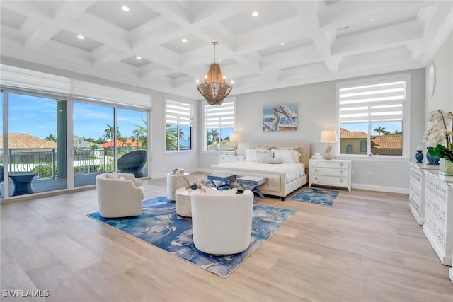 1070 Dana Ct, Marco Island, FL 34145 - bedroom featuring access to exterior, a chandelier, light wood-style floors, beam ceiling, and baseboards