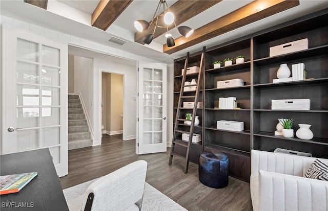 20665 Napa Loop, Estero, FL 33928 - sitting room with stairway, wood finished floors, a chandelier, beamed ceiling, and french doors