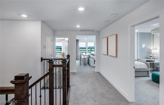 20665 Napa Loop, Estero, FL 33928 - hallway with an upstairs landing, carpet flooring, recessed lighting, and baseboards