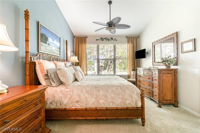 bedroom featuring light carpet, ceiling fan, and baseboards