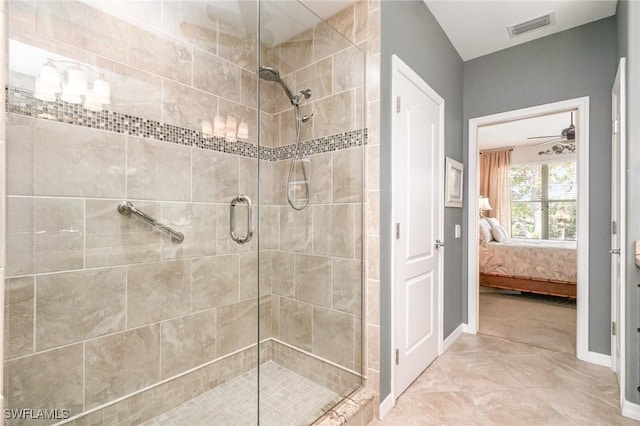 full bathroom with connected bathroom, a shower stall, and baseboards