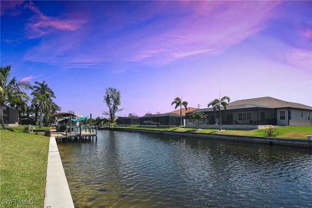 water view featuring a dock