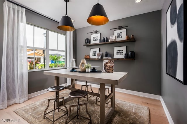 9102 Wisteria Way, Naples, FL 34114 - home office with baseboards, light wood finished floors, and recessed lighting
