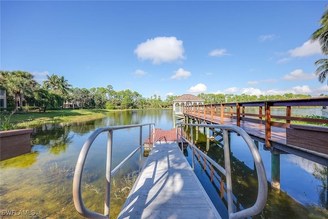 1786 Tarpon Bay Dr S Unit 102, Naples, FL 34119 - dock area featuring a water view