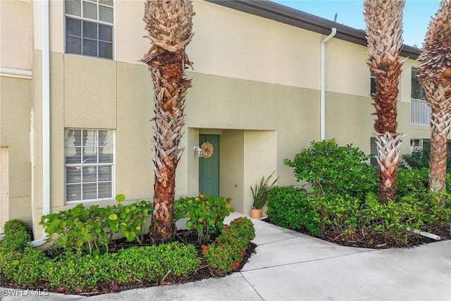 1786 Tarpon Bay Dr S Unit 102, Naples, FL 34119 - entrance to property featuring stucco siding