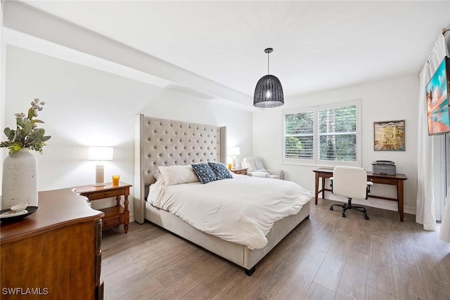 1786 Tarpon Bay Dr S Unit 102, Naples, FL 34119 - bedroom featuring a desk and light wood-type flooring