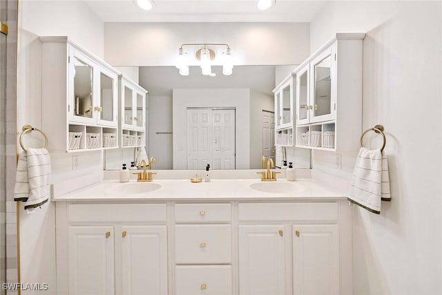 1786 Tarpon Bay Dr S Unit 102, Naples, FL 34119 - bathroom featuring double vanity