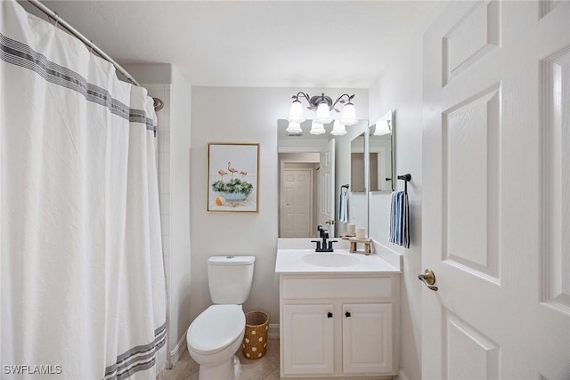 1786 Tarpon Bay Dr S Unit 102, Naples, FL 34119 - bathroom with toilet, tile patterned floors, vanity, and a shower with shower curtain