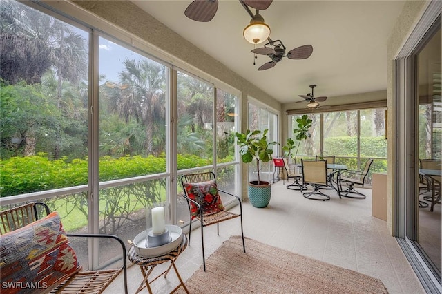 1786 Tarpon Bay Dr S Unit 102, Naples, FL 34119 - sunroom / solarium featuring a ceiling fan and outdoor dining area