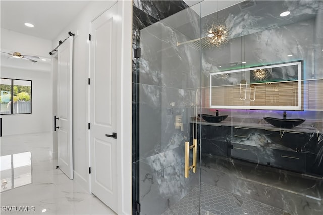 103 Chiquita Blvd N, Cape Coral, FL 33993 - bathroom featuring marble tiled floors, a marble finish shower, recessed lighting, a ceiling fan, and vanity