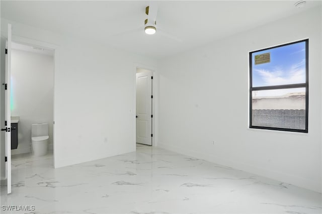 103 Chiquita Blvd N, Cape Coral, FL 33993 - spare room with baseboards, ceiling fan, and marble finish floors