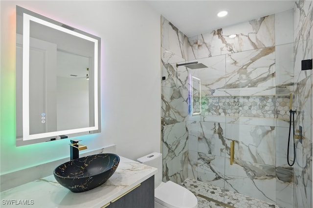 103 Chiquita Blvd N, Cape Coral, FL 33993 - bathroom featuring a marble finish shower, toilet, vanity, and recessed lighting