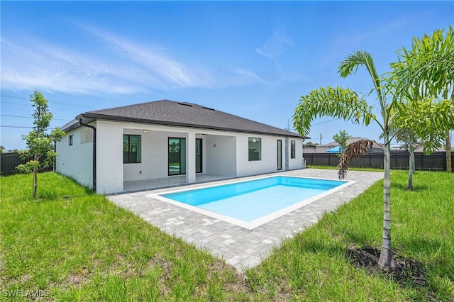 103 Chiquita Blvd N, Cape Coral, FL 33993 - back of property featuring a patio and stucco siding