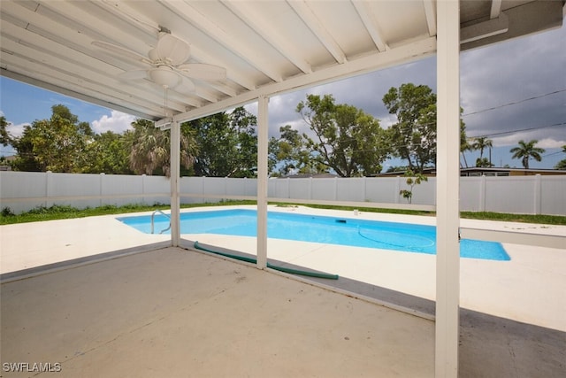 4370 Deleon St, Fort Myers, FL 33901 - view of swimming pool featuring ceiling fan, a patio area, and a fenced backyard