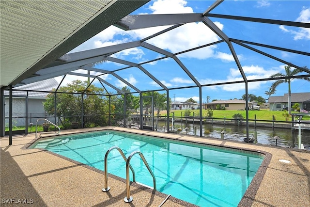 1414 Shelby Pkwy, Cape Coral, FL 33904 - swimming pool featuring a water view, a patio area, and a lanai