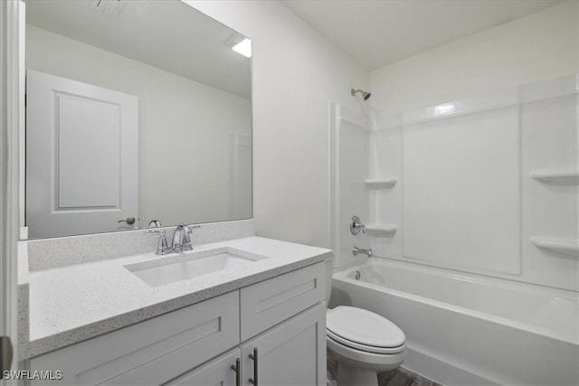 bathroom with toilet, vanity, bathtub / shower combination, and wood finished floors