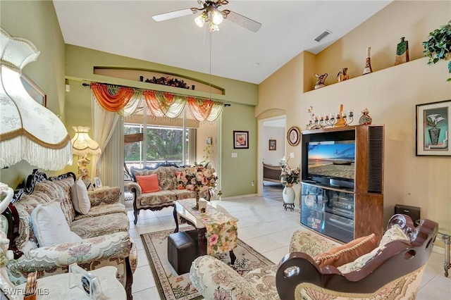8012 Sivon Way Unit 902, Naples, FL 34119 - tiled living area with a ceiling fan, high vaulted ceiling, baseboards, and arched walkways