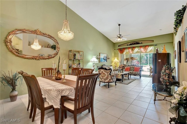 8012 Sivon Way Unit 902, Naples, FL 34119 - dining space with ceiling fan, light tile patterned flooring, high vaulted ceiling, and a chandelier