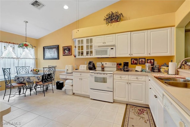 8012 Sivon Way Unit 902, Naples, FL 34119 - kitchen featuring white appliances, a sink, light tile patterned flooring, light countertops, and white cabinets