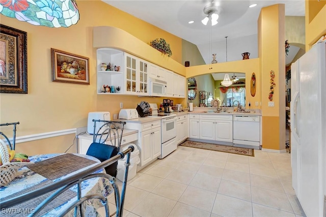 8012 Sivon Way Unit 902, Naples, FL 34119 - kitchen featuring white appliances, a sink, ceiling fan, white cabinetry, and glass insert cabinets