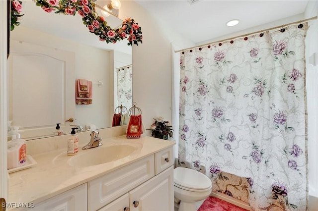 8012 Sivon Way Unit 902, Naples, FL 34119 - bathroom with toilet, shower / tub combo with curtain, and vanity