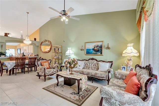 8012 Sivon Way Unit 902, Naples, FL 34119 - living room with high vaulted ceiling, a ceiling fan, and light tile patterned floors