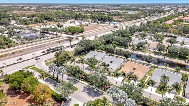 8012 Sivon Way Unit 902, Naples, FL 34119 - aerial view of property's location with nearby suburban area and a nearby body of water