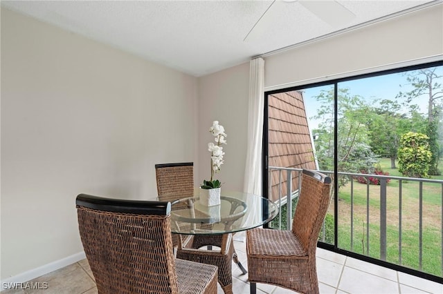 430 Meadowlark Ln Unit 430B, Naples, FL 34105 - dining space with light tile patterned floors and baseboards