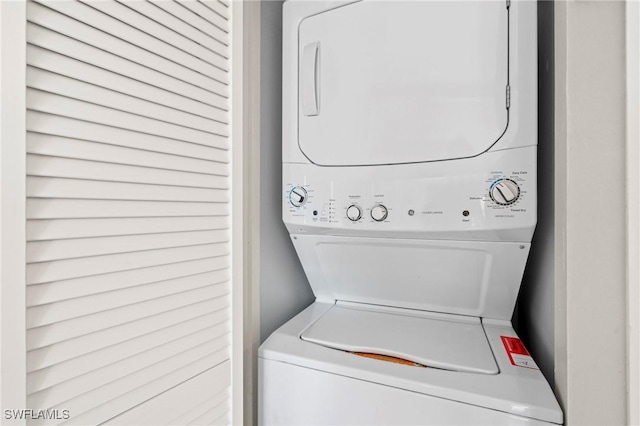 430 Meadowlark Ln Unit 430B, Naples, FL 34105 - laundry room with stacked washer / drying machine