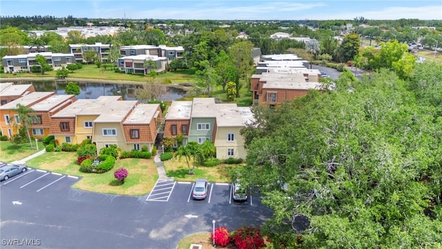 430 Meadowlark Ln Unit 430B, Naples, FL 34105 - aerial perspective of suburban area with a large body of water