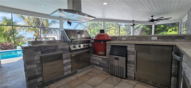 view of patio / terrace with area for grilling, a lanai, and an outdoor pool