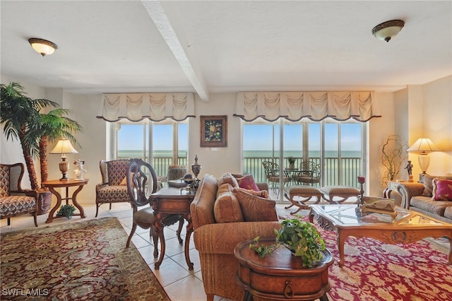 1020 S Collier Blvd Unit 402, Marco Island, FL 34145 - living room with beam ceiling, light tile patterned flooring, and a water view