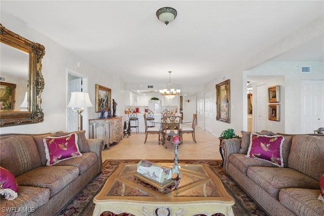 1020 S Collier Blvd Unit 402, Marco Island, FL 34145 - living area with a chandelier and light tile patterned flooring