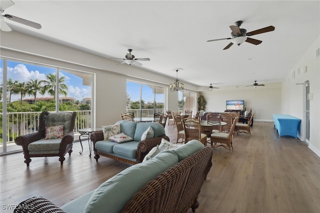 1020 S Collier Blvd Unit 402, Marco Island, FL 34145 - living area featuring ceiling fan and wood finished floors