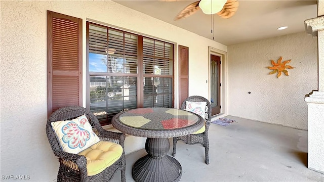 view of patio / terrace featuring a ceiling fan