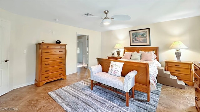 bedroom featuring ceiling fan and baseboards