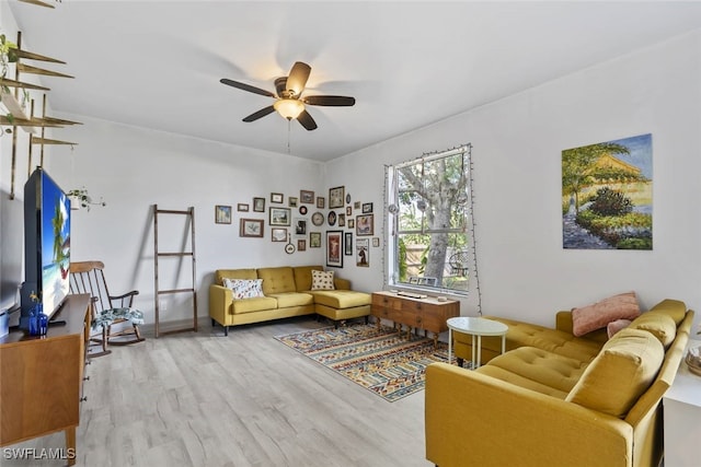 857 Bedford Dr, Lehigh Acres, FL 33974 - living room with wood finished floors and ceiling fan