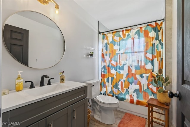 857 Bedford Dr, Lehigh Acres, FL 33974 - bathroom featuring toilet, vanity, and shower / bathtub combination with curtain