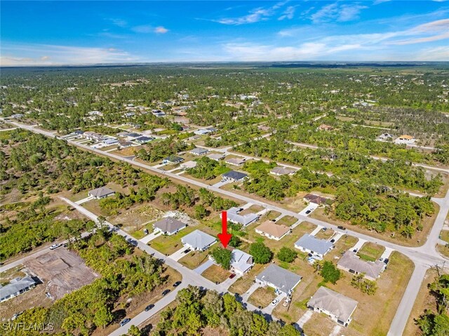 857 Bedford Dr, Lehigh Acres, FL 33974 - aerial view of property's location featuring nearby suburban area