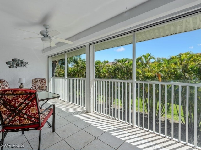 850 Elkhorn Ct Unit 222, Marco Island, FL 34145 - sunroom / solarium featuring a ceiling fan and outdoor dining space